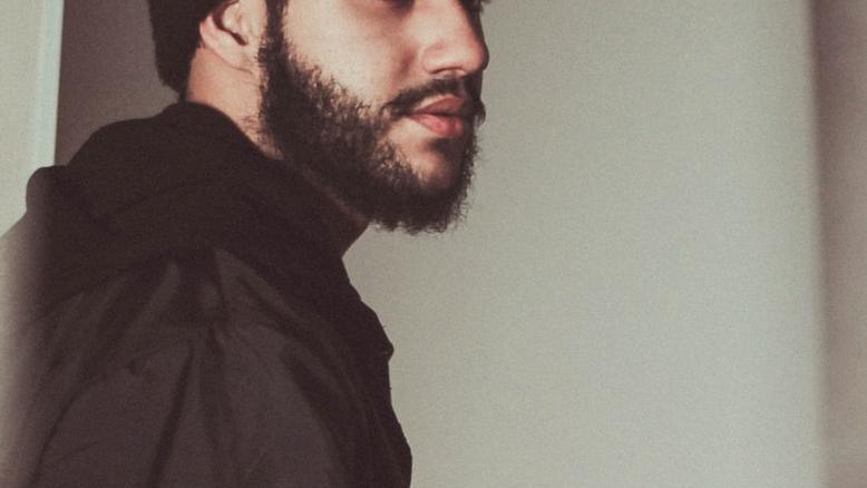 man standing near staircase